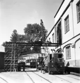 PM 3 ?? av maskindelar på Papyrus fabriksområde.