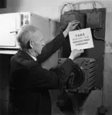 Säkerhetstjänst, elreparation.
Antagligen Övermontör Oskar Dahlström