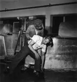 Säkerhetstjänst, halkning.
Två män med på bilden.