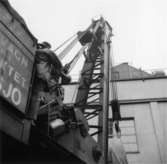 PM3 Yankeecylinder, transport med SJ:s katastrofkran.
En okänd man.