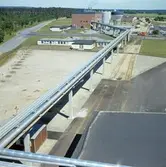 Exteriörbild från Papyrus Nymölla AB. Ledning från massabruket.