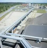 Exteriörbild från Papyrus Nymölla AB. Ledning från massabruket.