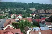 Vy över bebyggelsen i Huskvarna vid Husqvarna AB. Bilden är troligen tagen från det nya huset på Rosenborgsgatan.