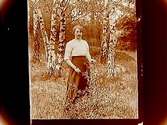 En kvinna.Anna Olsson c/o kyrkoherde Ivan Jäderlund.