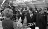 Konfektionsindustri 6 april 1968

Män klädda i kostym på besök på Saléns konfektion AB, står och tittar när en kvinna arbetar.