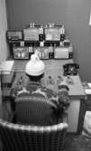 TV tittande, 4 februari 1967

Person som sitter och tittar på flera TV apparater samtidigt./IT