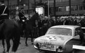 Sverige - Västtyskland 27 september 1965

Fotbollsfans i samband med landskamp, i förgrunden bil med påmålade slogans. Ridande poliser.