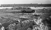 Snömodd och översvämning bland annat i Varberga 1 februari 1966

Bil i vattensamling på vintrig gata