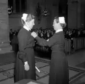 Nikolaikyrkan, sjuksystrar.
12 december 1954.