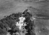 Flygfoto över Irvingsholms Gård.Bilden tagen för vykort.