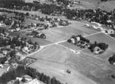 Flygfoto över Åmmeberg.Bilden tagen för vykort.Förlag: Axel Hagberg, Åmmeberg.