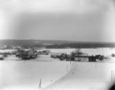 Svennevads by sedd från kyrktornet.
Bostadshus, byggnader, vy över samhället.