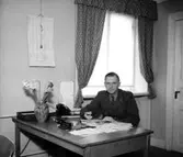 Fo-staben, kontorsinteriör, en officer vid skrivbordet.