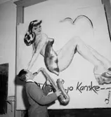 Whispering Band på Teknis, en man med musikinstrument (saxofon).