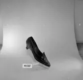 En sko. Nr: 44687.
Oscaria Skofabrik.