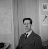 En man, bröstbild.LindmanBilden tagen för pass.