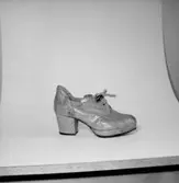 En sko.
Oscaria Skofabrik.