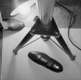 En sko.
Oscaria Skofabrik.