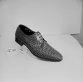 En sko.
Oscaria Skofabrik.