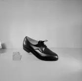 En sko.
Oscaria Skofabrik.