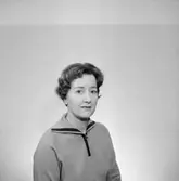 En kvinna, bröstbild.
Örebro Sparbank.