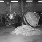 Betongblandare, arbetare.
Byggnadsproduktion AB.