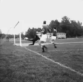 Fotbollsmatch.
Sund-Emba.