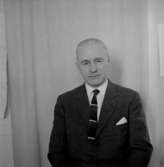 En man, bröstbild.Bilden tagen för eventuellt pass.