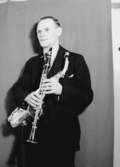 En man med musikinstrument (Saxofon).
Rune Kihlström