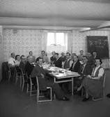 Interiör, grupp, studiecirkel.
Konsum.