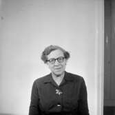 En kvinna, bröstbild.Gustafsson & Görtz personal.