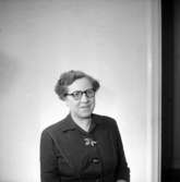 En kvinna, bröstbild.Gustafsson & Görtz personal.