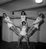 Gymnastik, fyra flickor.