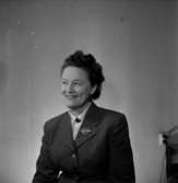 En kvinna, bröstbild.Gustafsson & Görtz personal.