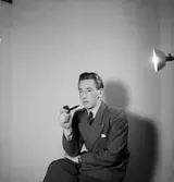 En man med pipa.
Curt Nilsson