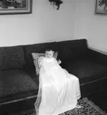 Rumsinteriör, en baby, barndop.
Gäverth