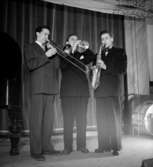 Holmströms orkester, tre män med musikinstrument.