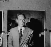 Whispering Band, en man med musikinstrument.