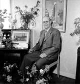 Rumsinteriör, en man.Lindroos