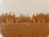 Gymnastikföreningen Athena, gymnastikuppvisning, 18 personer.