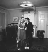 Rumsinteriör, två personer, möhippa.