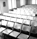 Idrottshuset, interiör, stolar.
Topp Industri