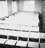 Idrottshuset, interiör, stolar.
Topp Industri