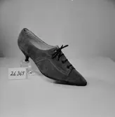 En sko.
Oscaria Skofabrik.