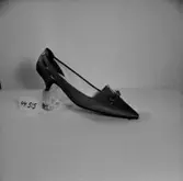 En sko.
Oscaria Skofabrik.