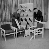 Interiör, inredningsarbete, två män.
Oscaria