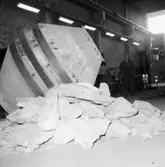 Betongblandare, arbetare.
Byggnadsproduktion AB.