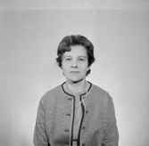 En kvinna, bröstbild.
Örebro Sparbank.