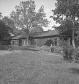 Byggnader, en pojke.22 augusti 1942.