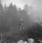 Pyromanbränderna i Kopparberg den 19 juni 1961. Brandsläckning.